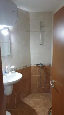 a bathroom with a shower and a sink at Rositsa 28 in Pamporovo