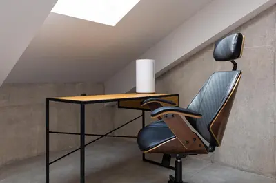 a desk and a chair in a room at Industrial-style 2BD Loft with Parking Spot by Flat Mаnager in Plovdiv