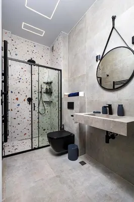 a bathroom with a shower and a toilet and a sink at Industrial-style 2BD Loft with Parking Spot by Flat Mаnager in Plovdiv