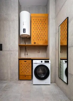a laundry room with a washing machine and a mirror at Industrial-style 2BD Loft with Parking Spot by Flat Mаnager in Plovdiv