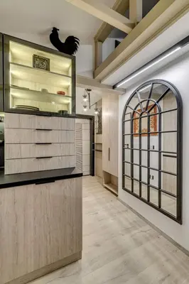 a kitchen with a counter and a large window at Top 5 - Loft - Top Location - Designer Interior in Sofia