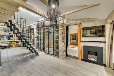 a room with a fireplace and a fire place at Top 5 - Loft - Top Location - Designer Interior in Sofia