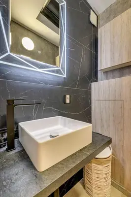 a bathroom with a white sink and a mirror at Top 5 - Loft - Top Location - Designer Interior in Sofia