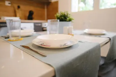 a white bowl sitting on top of a table at Apartment in the city center in Plovdiv